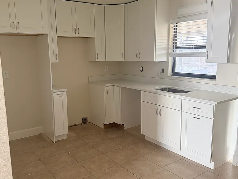 Fully renovated kitchen which will have new appliances including a microwave & dishwasher!