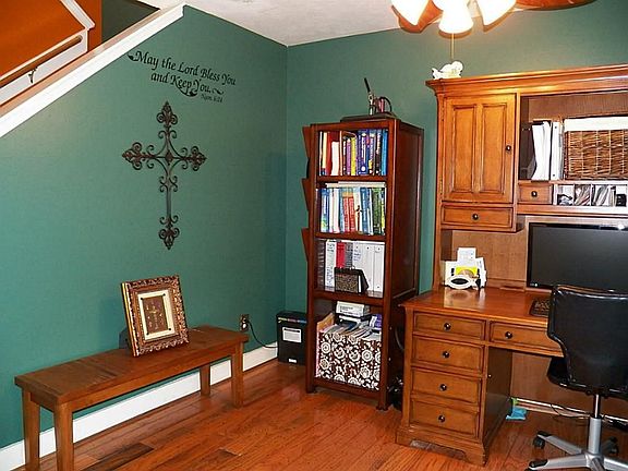 Formal dining room is currently being used as a home office