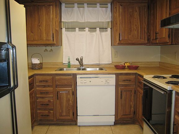Spacious, bright kitchen has plenty of counter and cabinet space.