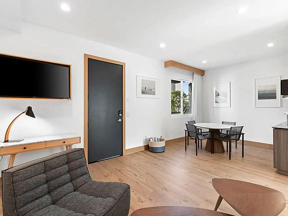 Sit back and unwind in front of the flat-screen TV.