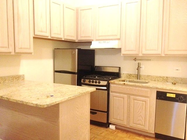 1st image of 417 W 50th St APT 1A