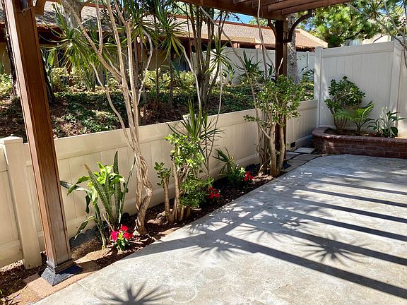 Patio with with view into the park area with Clubhouse with is available for lease to host private parties/entertainment.