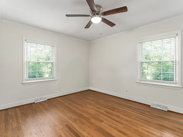 Second bedroom with hardwood flooring