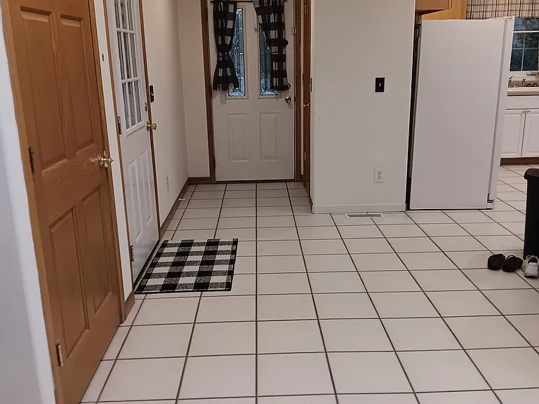 Front Entry/Garage Entry to left