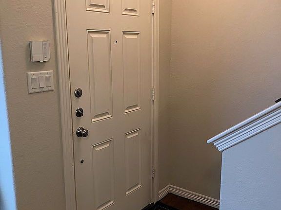 Just inside the front door