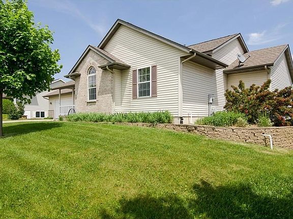 LEFT SIDE EXTERIOR AND LANDSCAPING