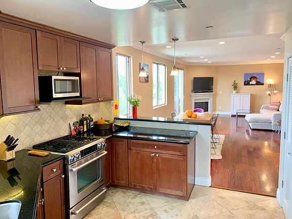 Kitchen flowing into living room