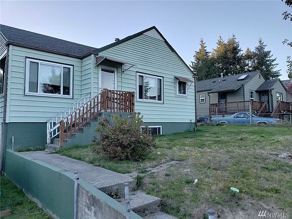 Not only is it cute, it's surprisingly large with a whole livable downstairs and a detached garage!