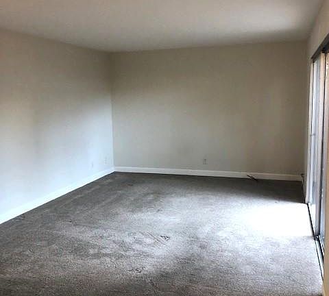 Large front room with sliding door to private patio