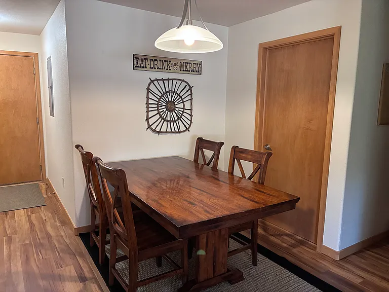 Dining table with 5 chairs and bench.