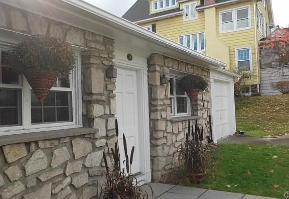 Distinctive front entry to The Stone House, quite Eurpopean