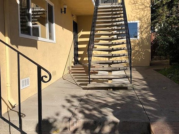 Front walk way, unit is 1st level in the back left