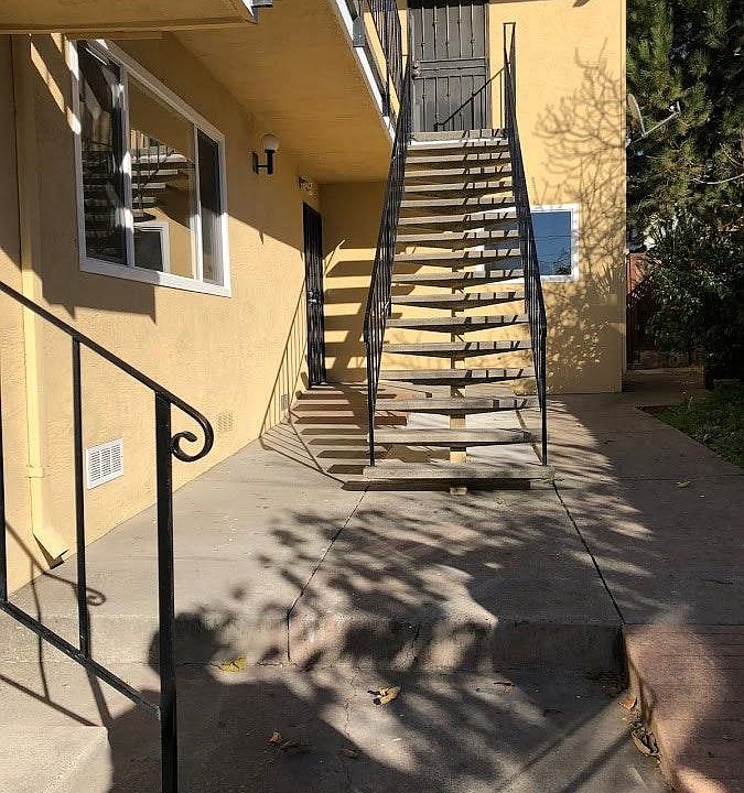 Front walk way, unit is 1st level in the back left