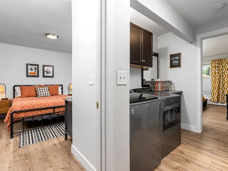 hallway to bedrooms and laundry area
