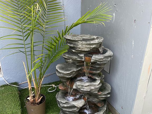 Water fountain in the yard for relaxation