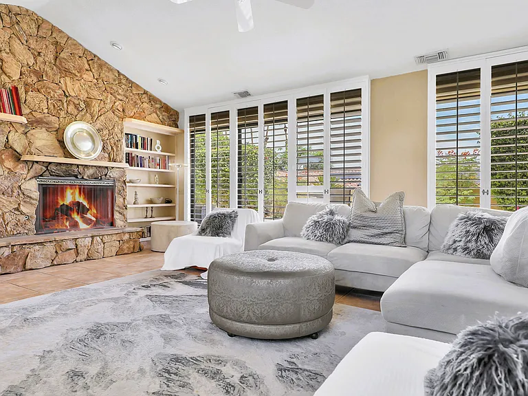 Living Room with fireplace and built in bookcase
