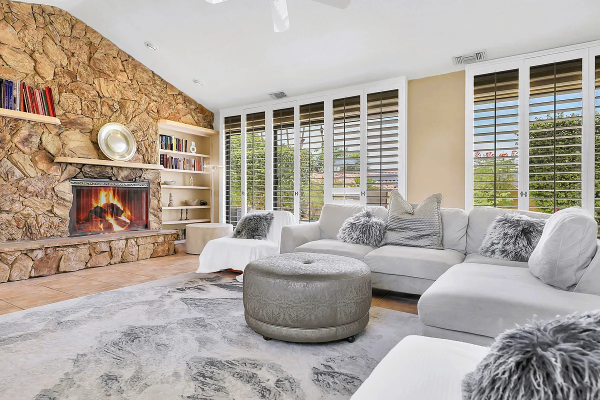 Living Room with fireplace and built in bookcase - 72816 Mesa View Dr