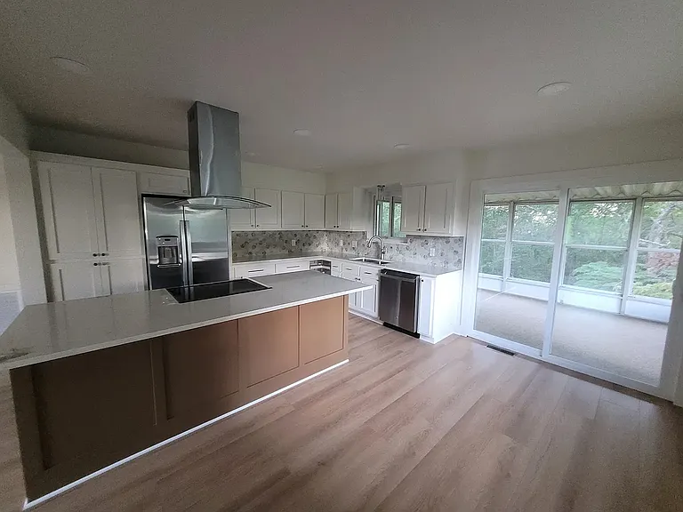 Kitchen area in evening.