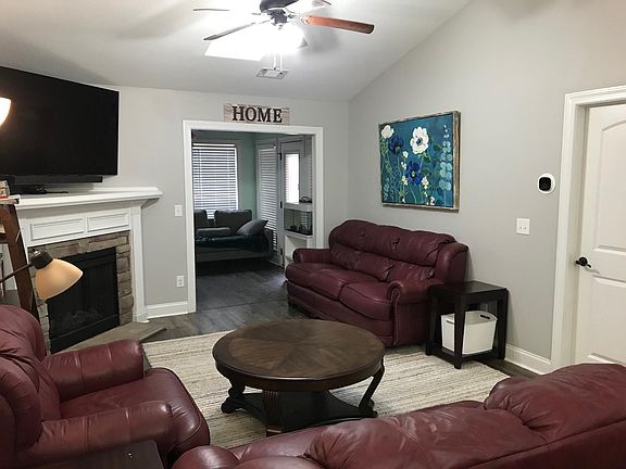 Living room looking into sunroom
