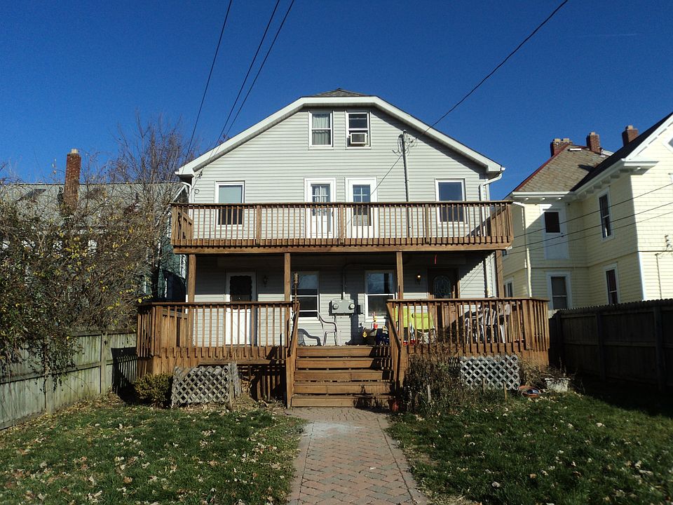 2 story deck with privacy fenced in yard