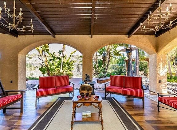 outdoor living area from side leads to backyard