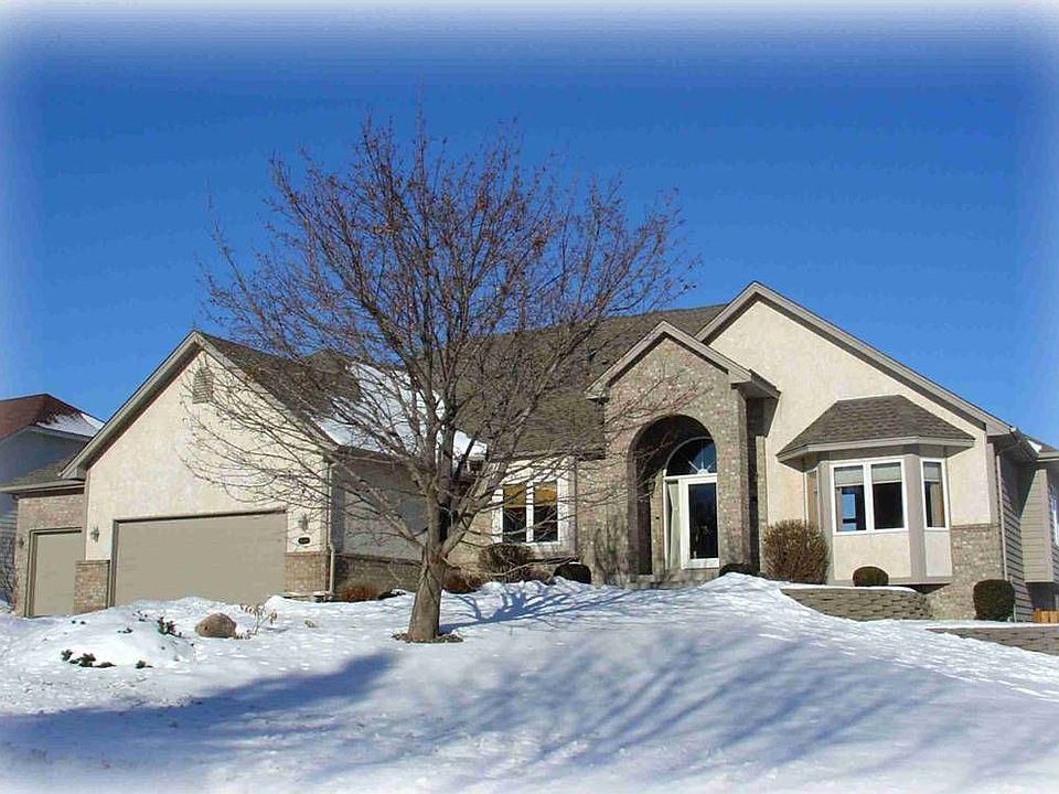 Home combines traditional detailing w/ high-tech amenities.