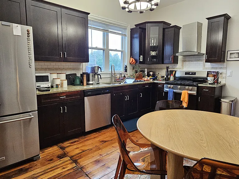 Roomy eat-in kitchen with stainless appliances