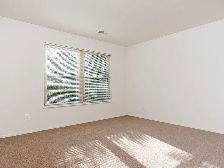 Large bedrooms with wood flooring throughout