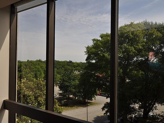 This home is on the far end of the building and does not have a view of the building behind. In the 