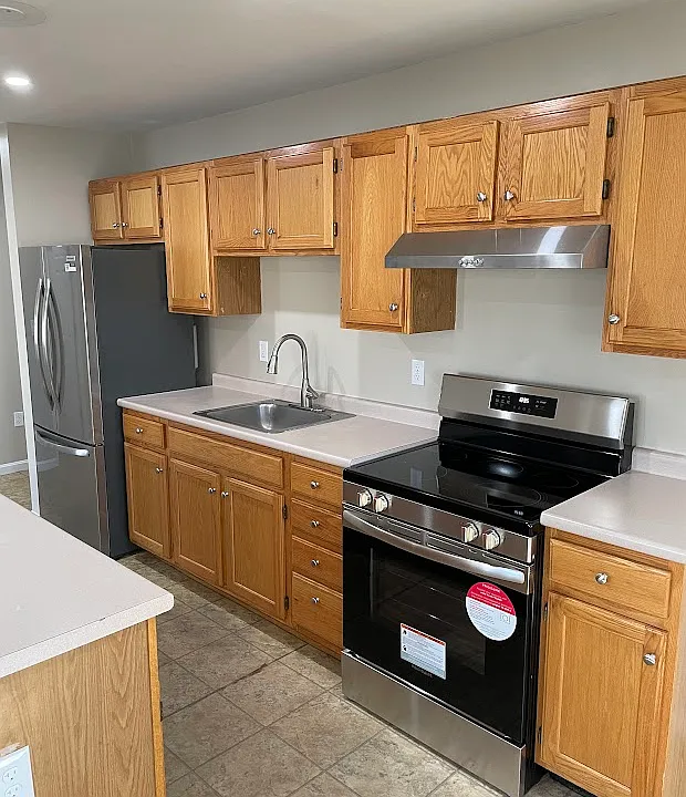 Large eat-in kitchen with brand new appliances and recessed lighting