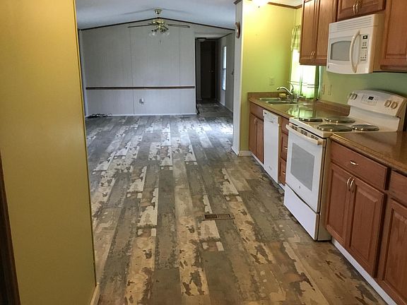 Open kitchen, dining, living area. New, easy to clean floors