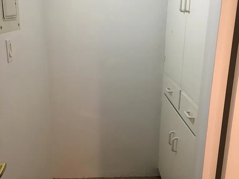 Extra storage space between bedroom and bathroom. Great to pile skis or other Colorado gear!