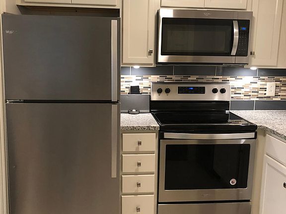 New stainless steel appliance with granite counter tops.