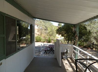 covered deck, carpeted, gated, lovely