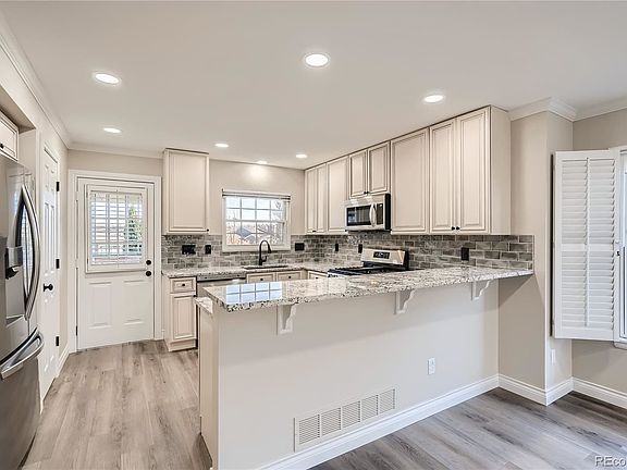 5th image of 7562 S Ivanhoe Way