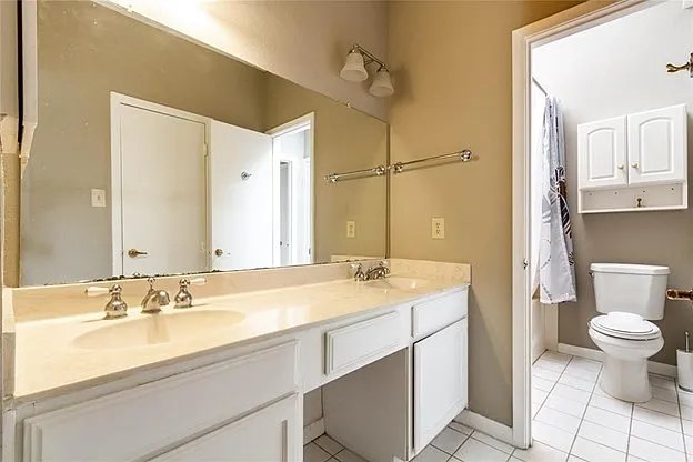 Double sink bathroom connected to the Master bedroom
