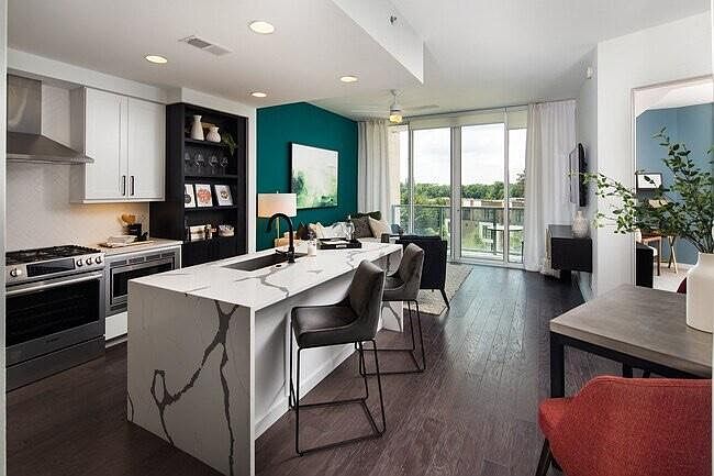 1st image of 1080 Park Ave NE Penthouse 38