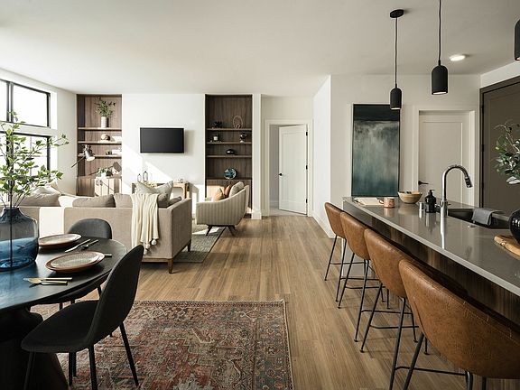 Experience the elegance of this open-concept living area designed for modern comfort.