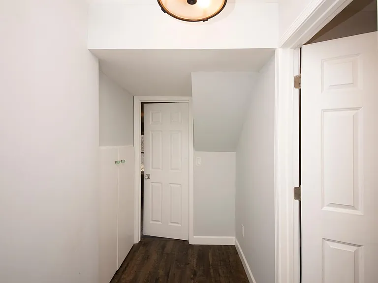 Upstairs hallway to bathroom #2 on right and master suite straight ahead.