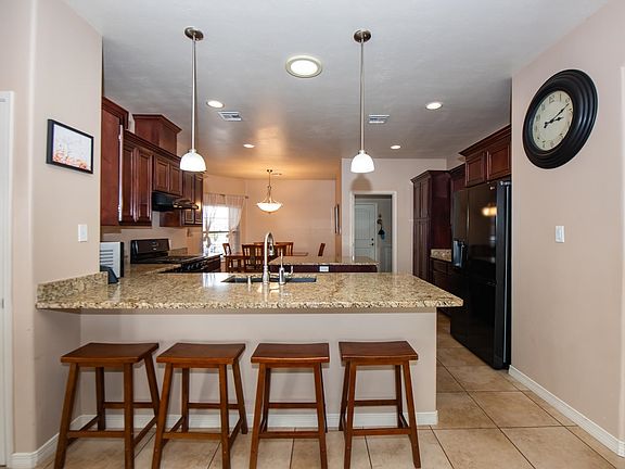 2nd image of 12127 E 35th St
