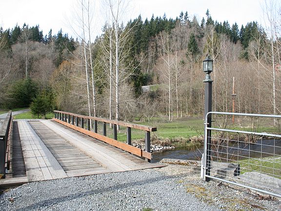 Across bridge at property