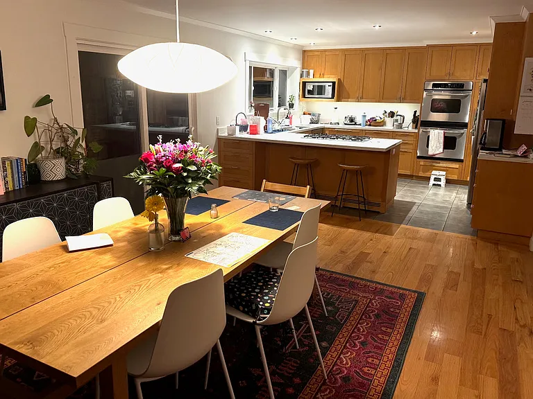 The kitchen and dining room in the evening