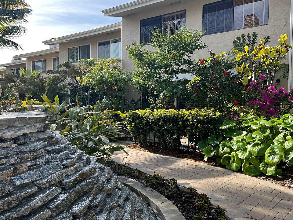 Fountain off backyard walkway.
