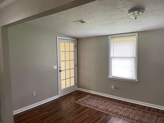 Dining Room with a door to the Screened Porch