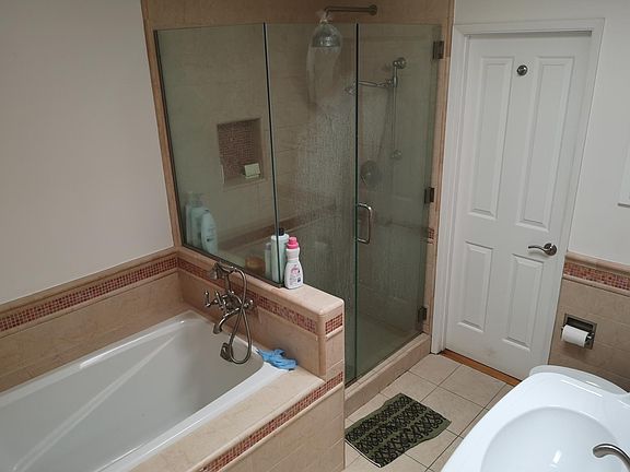 Deep soaking tub and separate shower