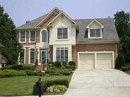 Nicely landscaped with level fenced in backyard
