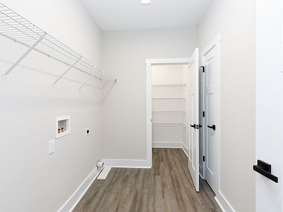 Laundry Room with Walk-In Pantry and mop closet