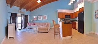 Kitchen and living room from the entrance to the condo.