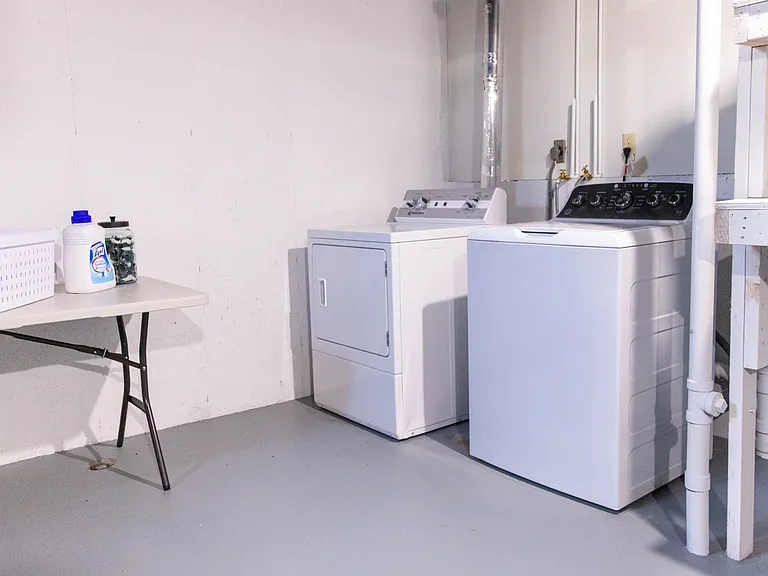 Laundry in unfinished basement
