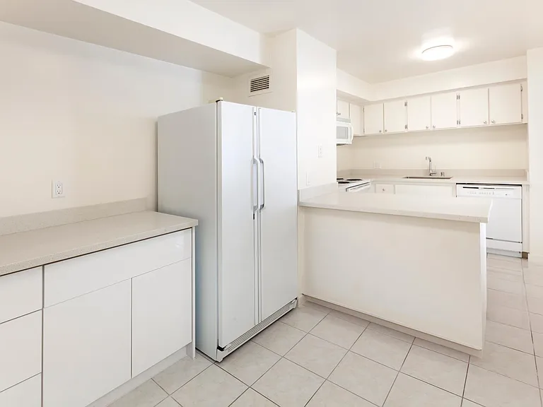 A full space dedicated to be your lovely kitchen. This gives you a spacious cooking and kitchen area, where you can prepare great meals.

This unit includes a refrigerator, gas range, etc. This can be your safe haven if you are a foodie or loves cooking.